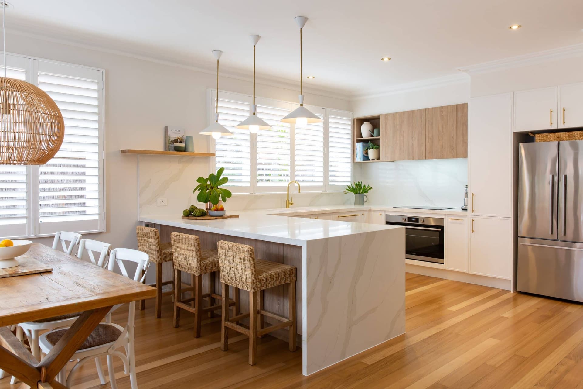 Elegant kitchen remodel with feature lighting and premium materials in Sydney