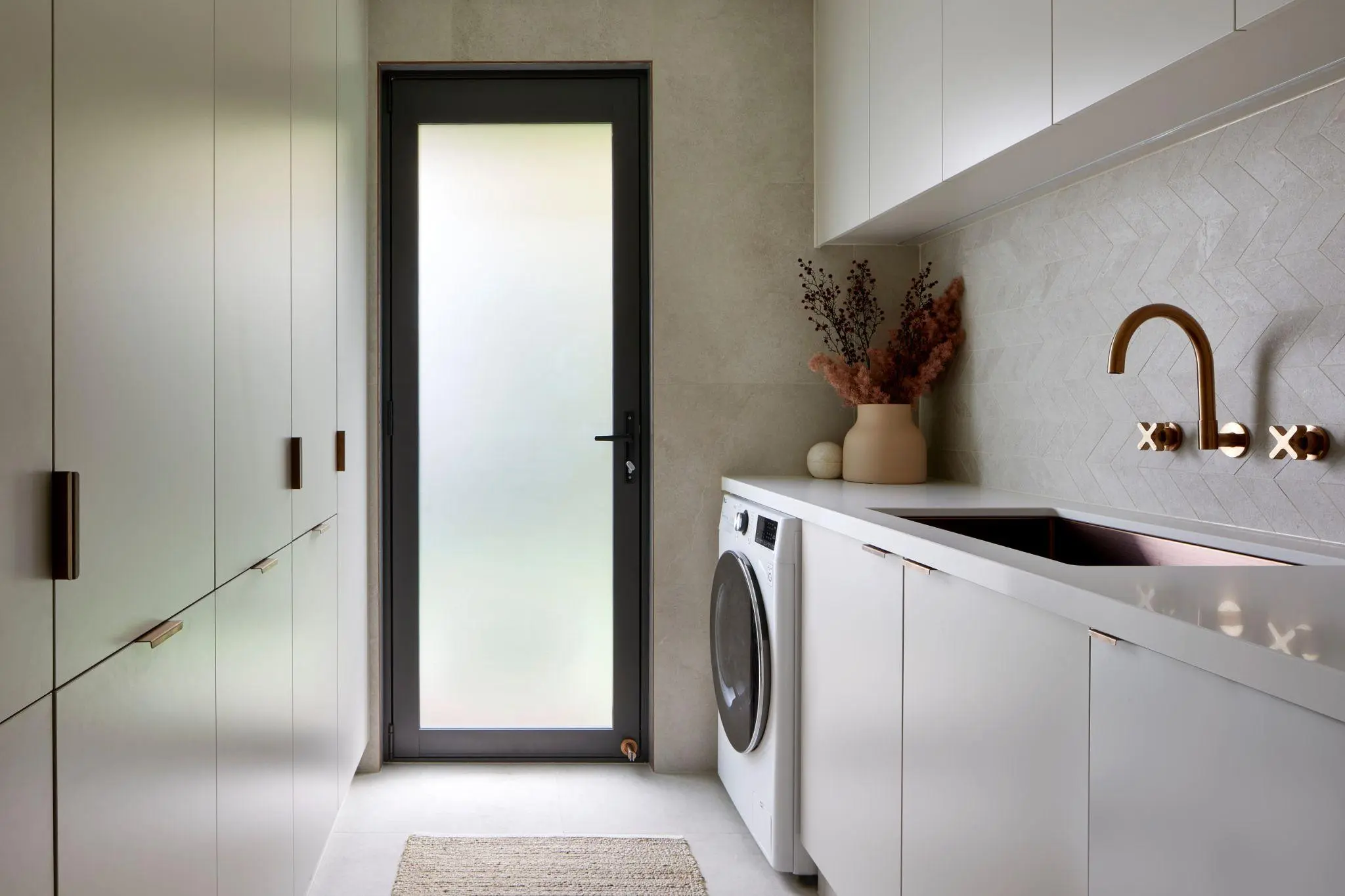 Functional laundry makeover with custom cabinetry in Sydney by Artistic Bathroom & Kitchen Renovations - Project NaN