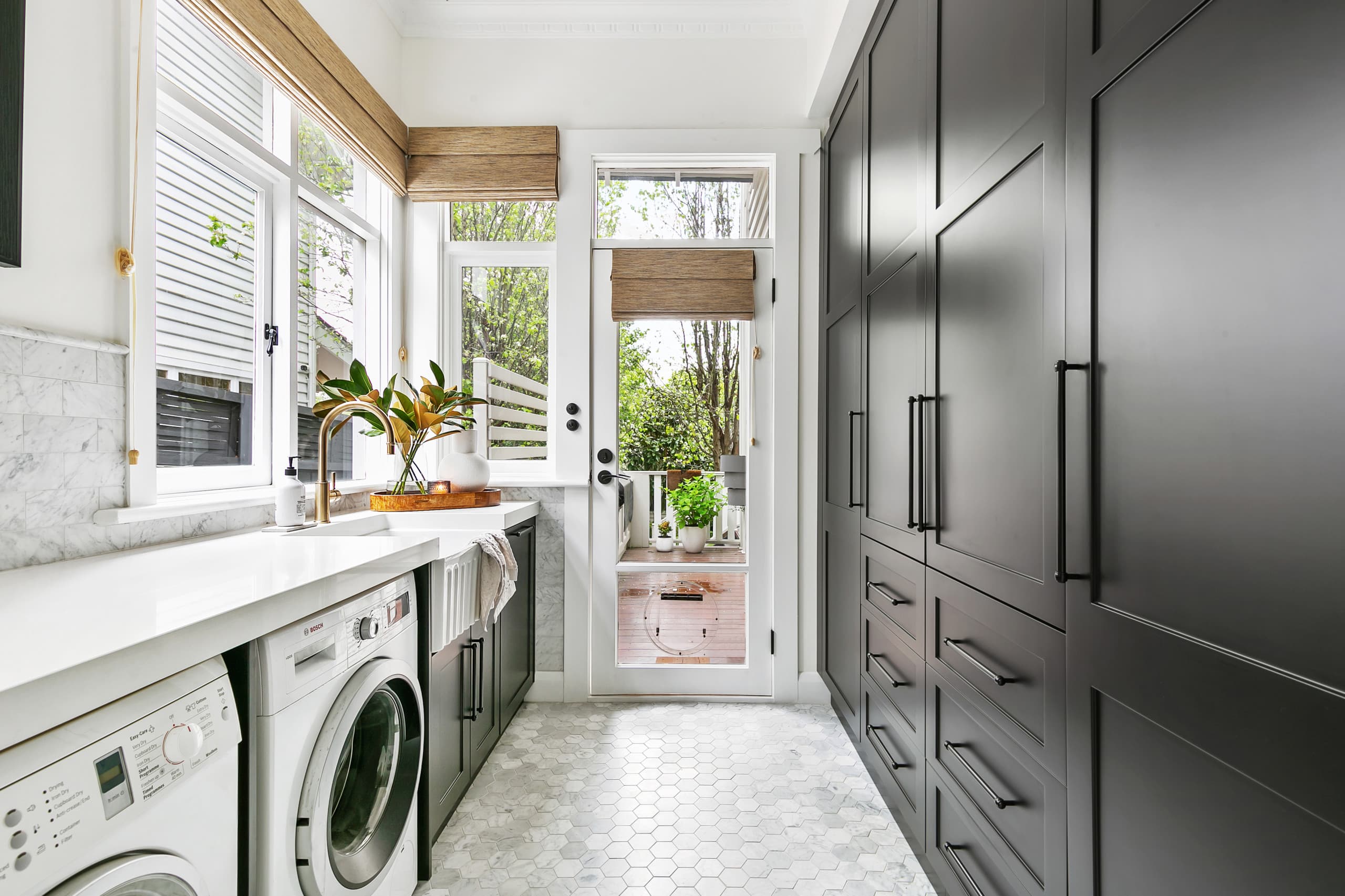 Modern laundry renovation with custom storage solutions in Sydney by Artistic Bathroom & Kitchen Renovations - Project NaN